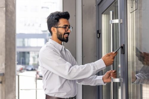 man using access control to get into work